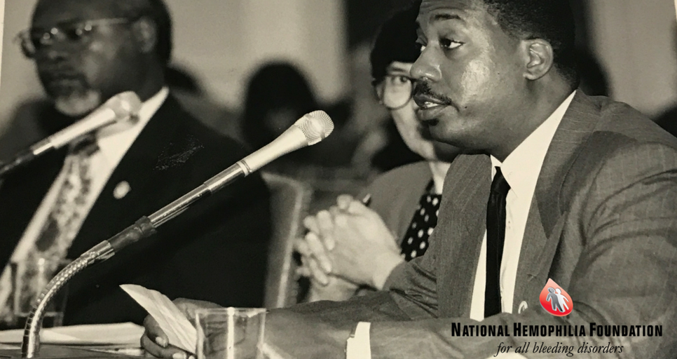 National Hemophilia Foundation Mourns The Loss of Longtime CEO Val Bias - black and white photo of Val speaking